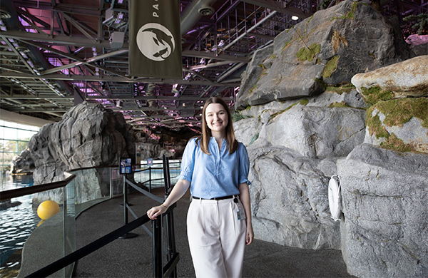 Julia Holzl inside of the Shedd Aquarium