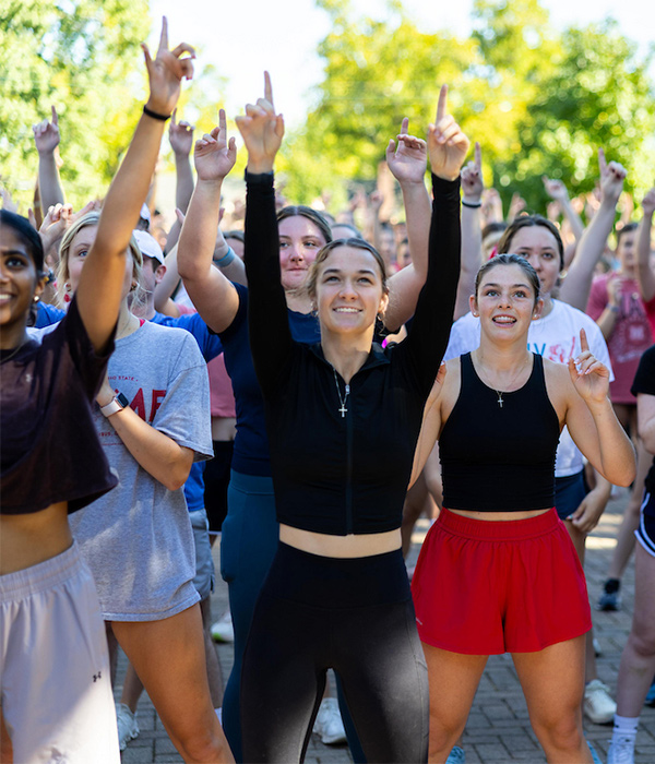 a group of students exercising together