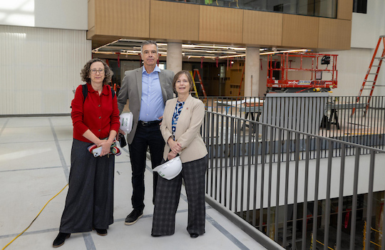 Gaile Pohlhaus, associate dean of the College of Arts and Science; Timothy Melley, director of the Humanities Center; and Renée Baernstein, dean of the College of Arts and Science at Bachelor Hall as it undergoes renovations