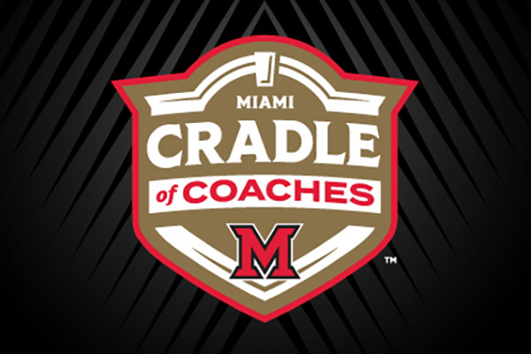 Miami University Cradle of Coaches logo, a white and gold shield on a black background
