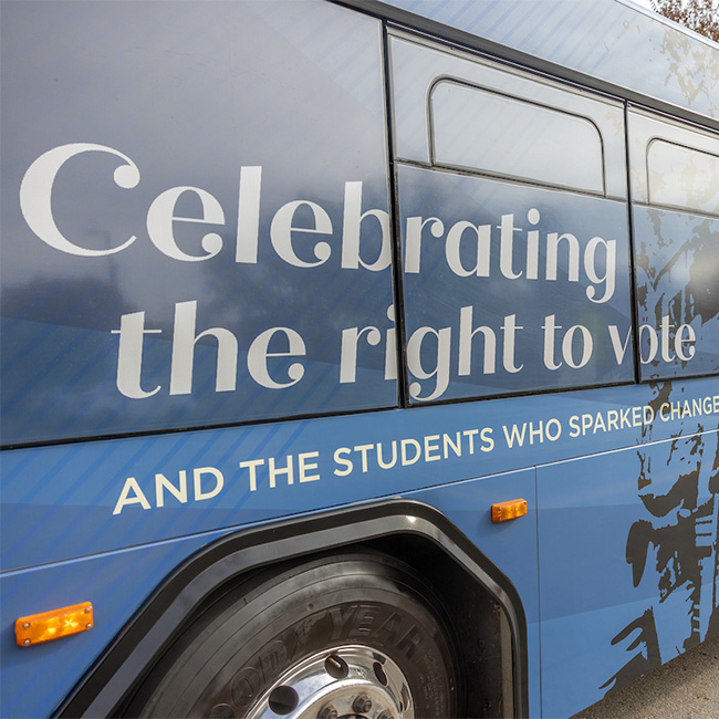 a graphic on a bus that says "celebrating the right to vote and the students who sparked change"