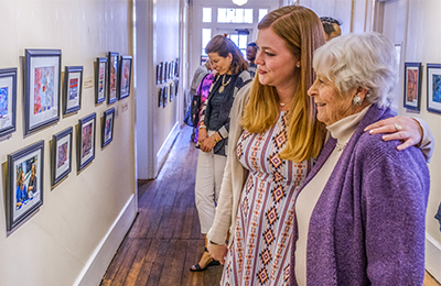 Samantha Kelly and her Grandma at an art show in Oxford