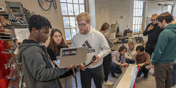 Miami University students working in a group during a manufacturing engineering workshop