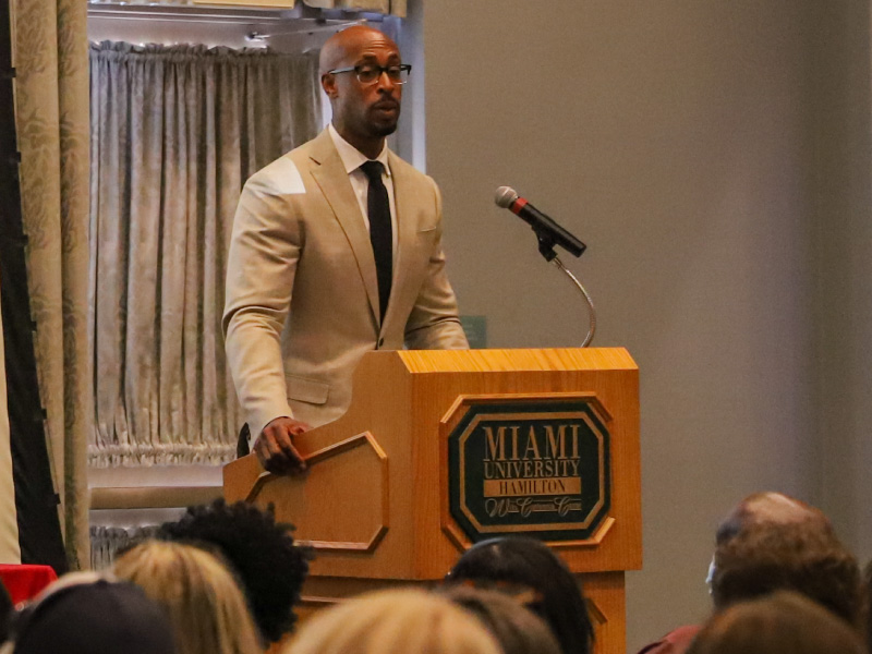 Vice President and Dean Ande Durojaiye speaking at a podium