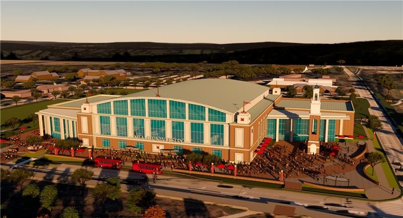 Aerial rendering of the front of the arena, a round topped building with a lot of red brick facing and glass windows