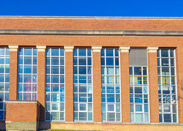 the back of billiings hall showing 2-story windows 