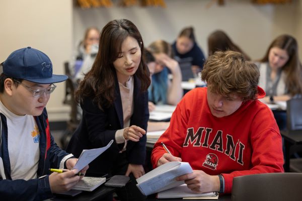 Faculty Member working with 2 students