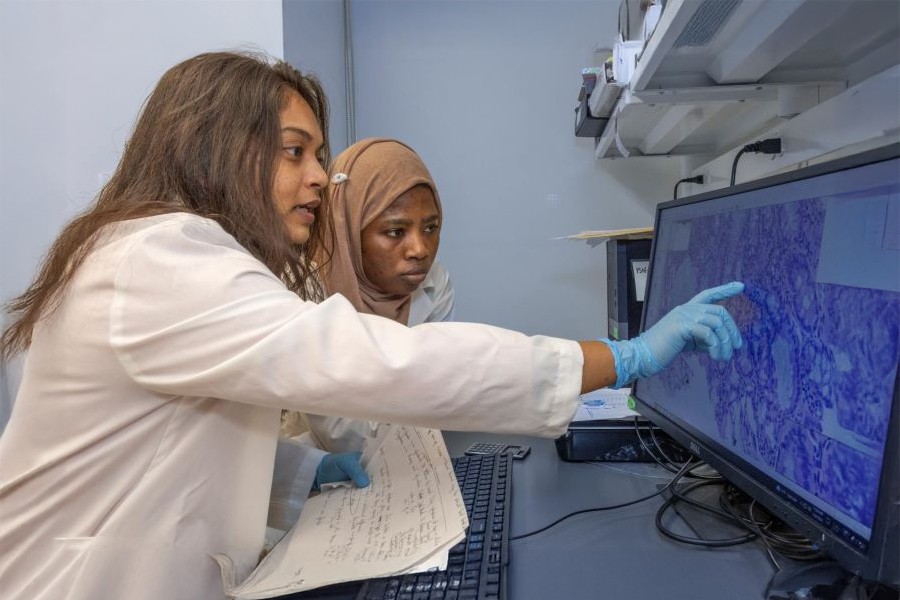 Student and Instructor working in a scienc lab