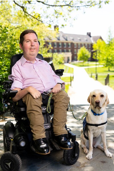 Dan Darkow and Service Dog Kismet Headshot