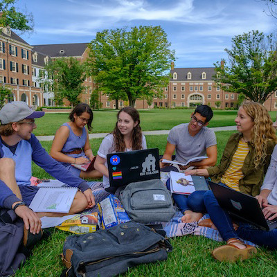 Students on the campus green. 