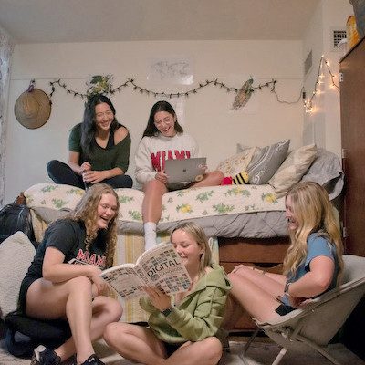 Students in a dormitory room.