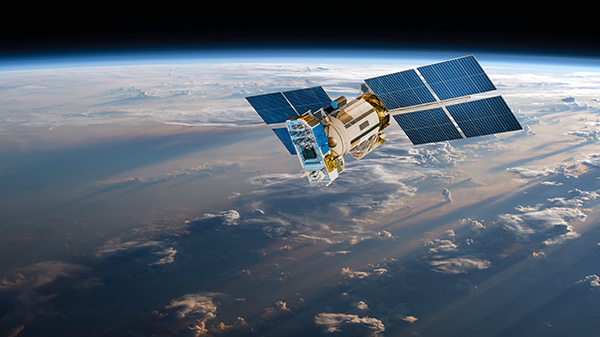 satellite floating in space above our earth
