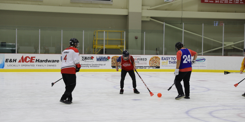 Students playing broomball