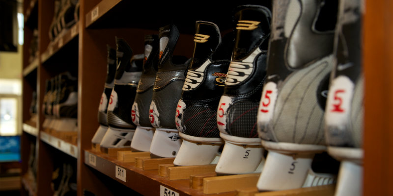 a closeup view of a rack of size 5 ice skates