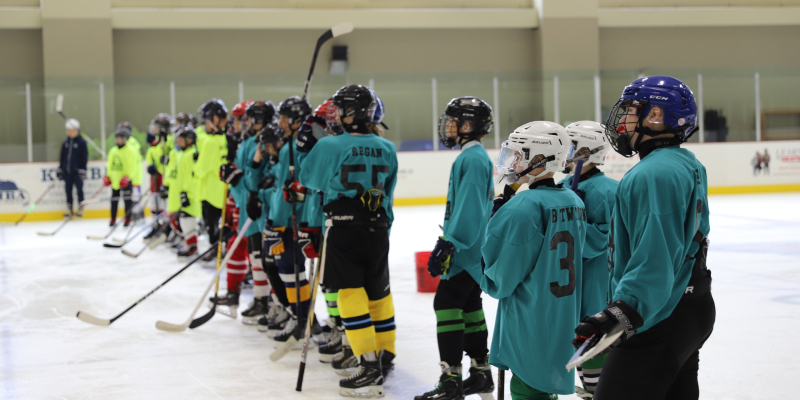 Group of hockey players at summer hockey school