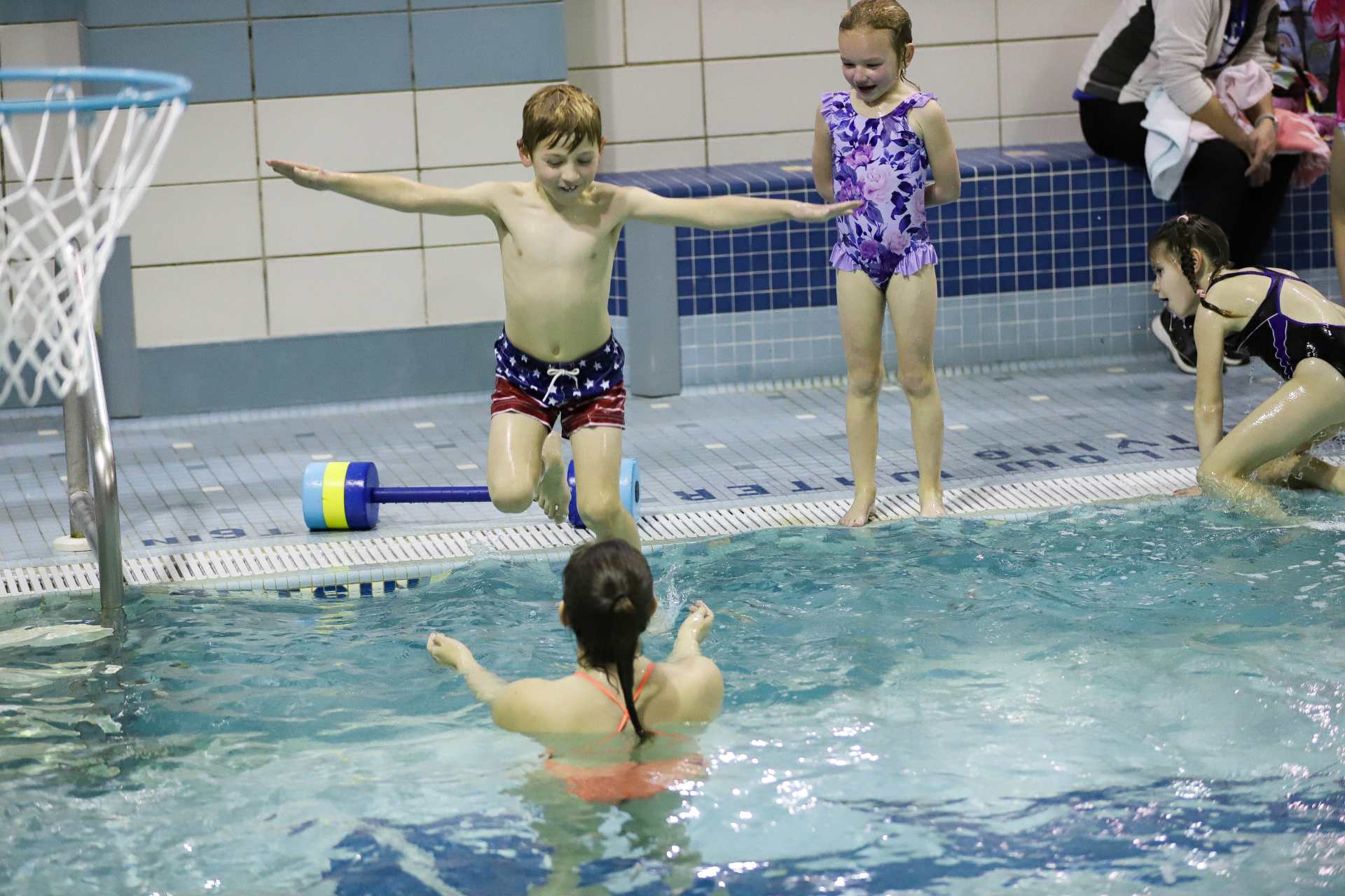 Marie Musbach teaching a learn to swim class