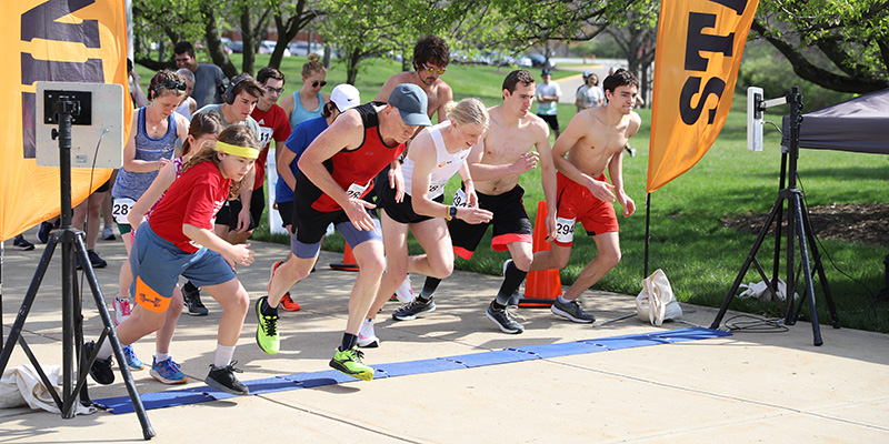 Runners take off at the start of the Red Brick Run