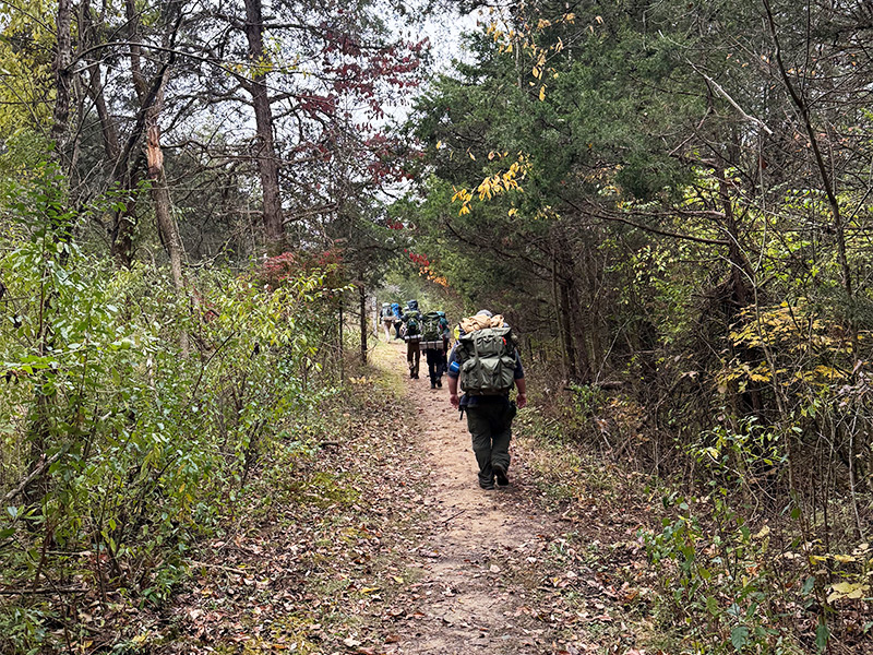 student hiking at red river gorge