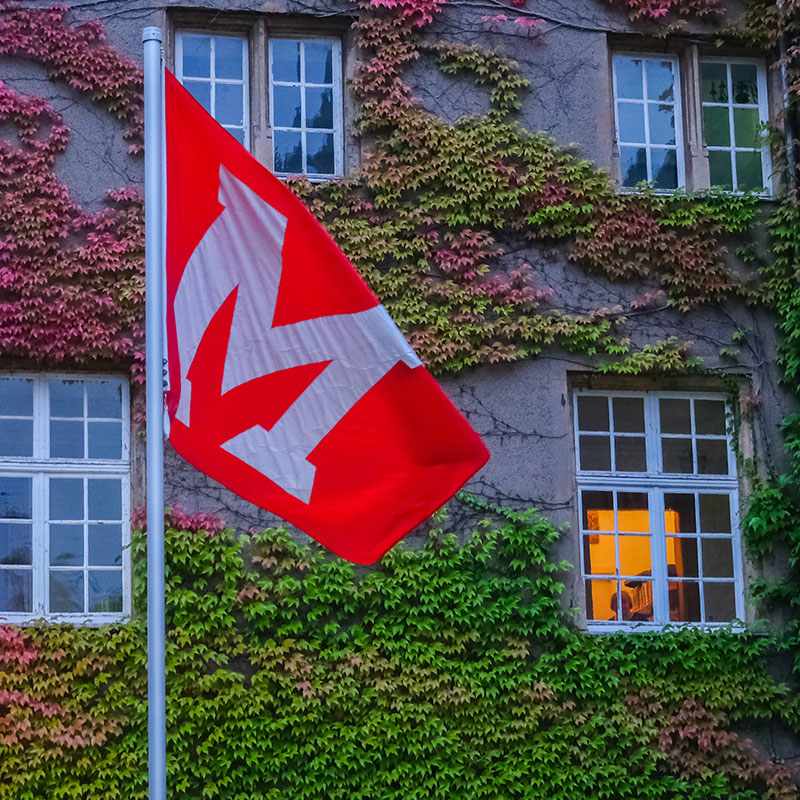 The Miami flag flying over the Luxembourg campus