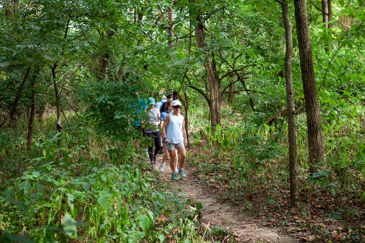 A group of people hiking in one of Oxford's many recreation areas