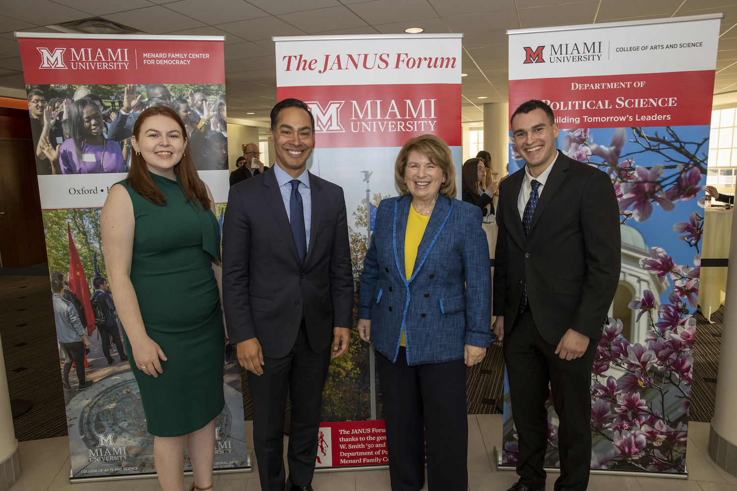 Murphy, Castro, Madras, and student posing together