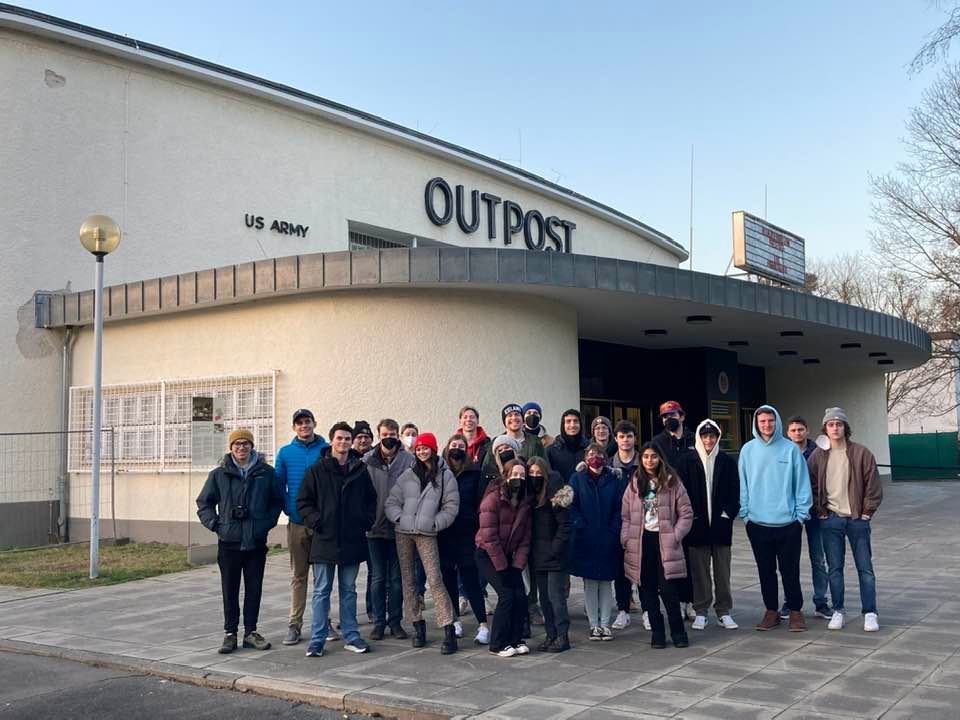 Miami students who attend the American in Berlin program standing in front of the US Army outpost