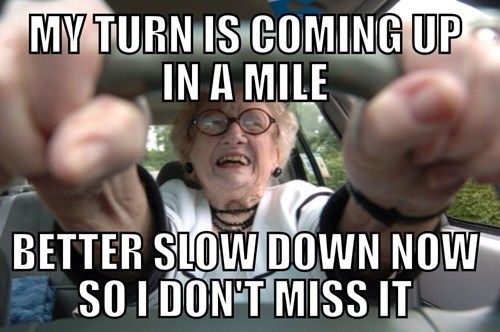 view of woman driving with the words overlayed "My turn is coming up in a mile. Better slow down so I don't miss it."