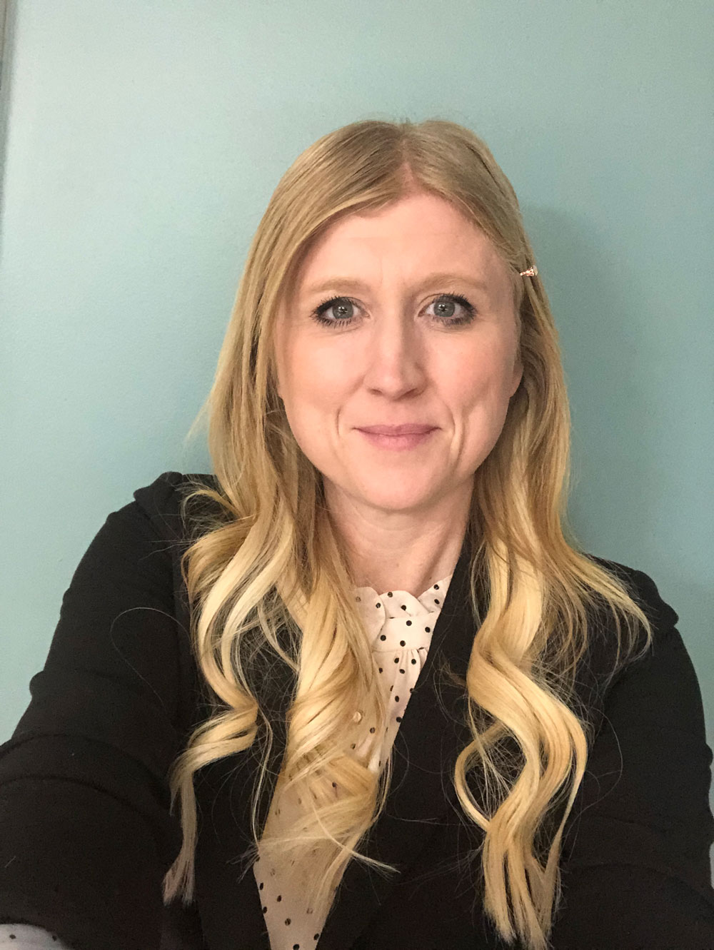 Professional Headshot of Andrea Hulshult.