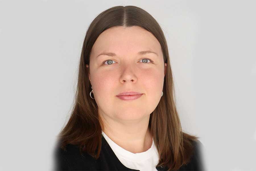 Professional headshot of Taylor Kwalton