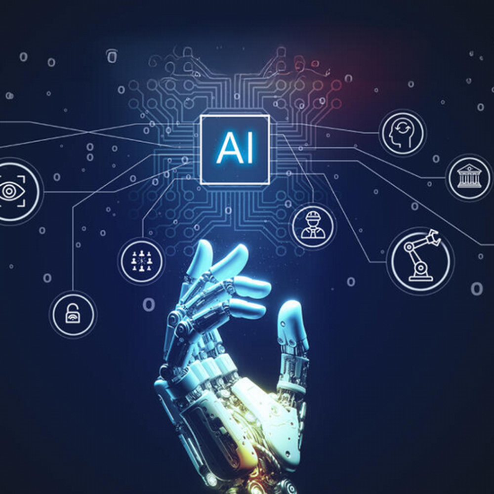 A robotic hand reaching towards a computer chip that says "AI".
