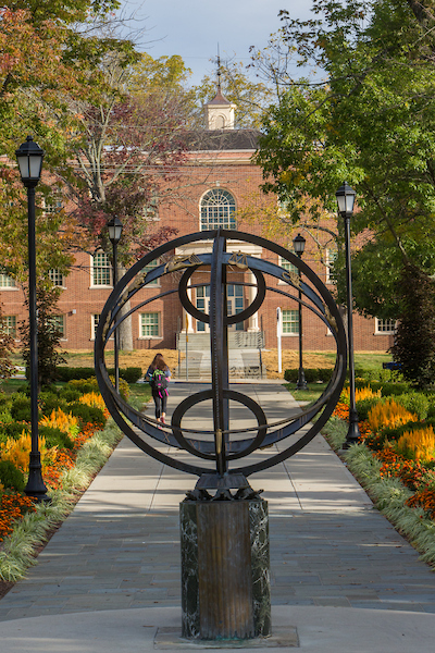 Kreger Hall taken from Central Quad with the Sundial in front of Kreger