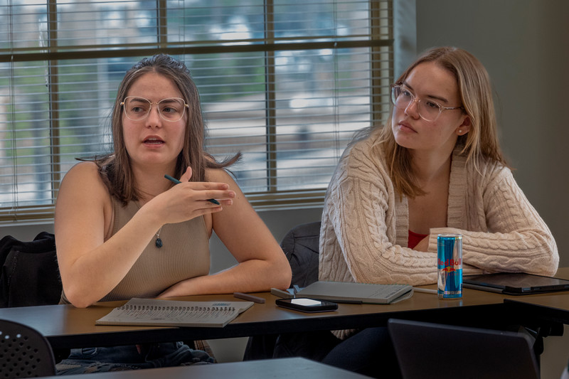 students speaking in the classroom