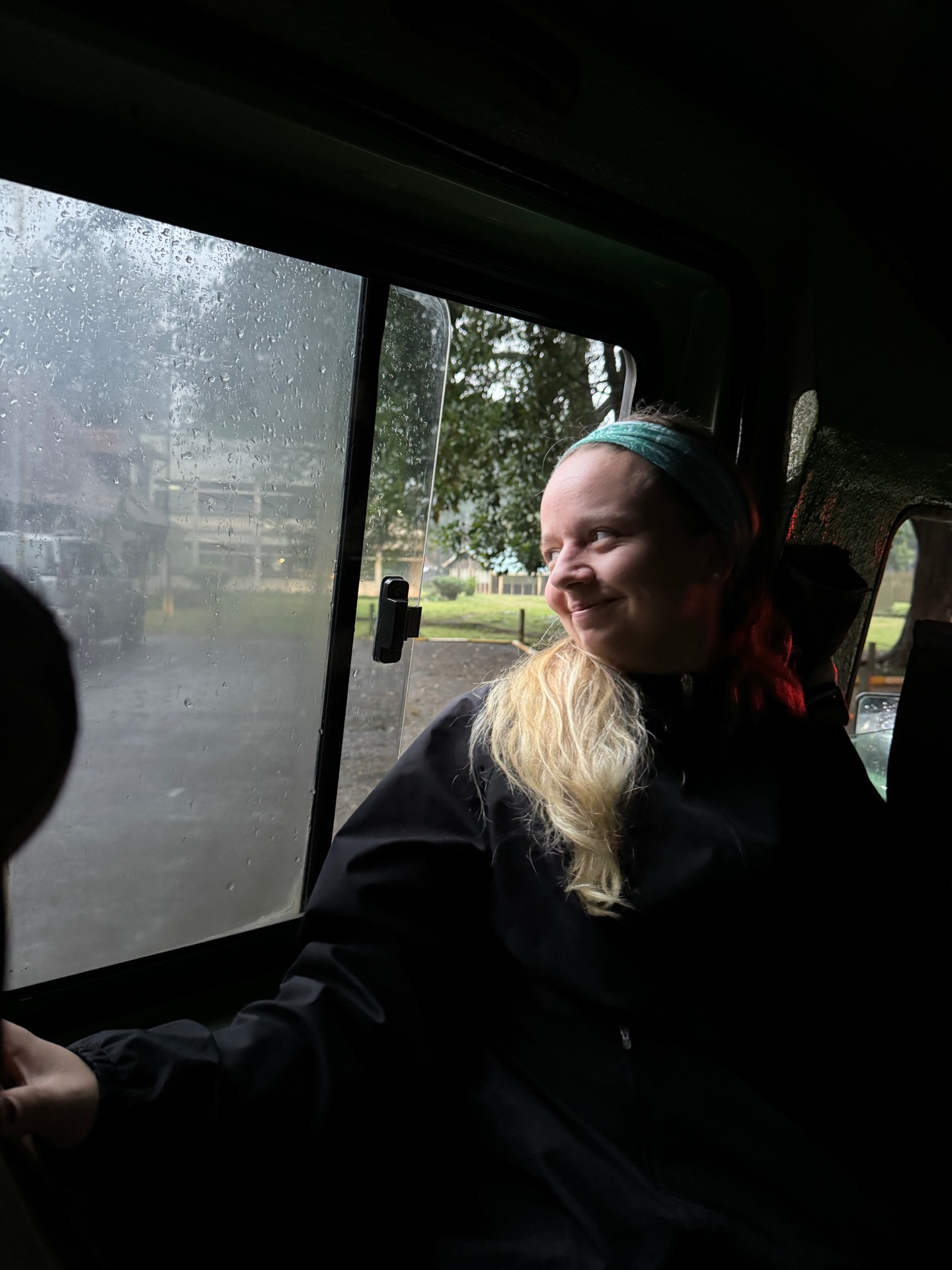 Carlee Simpson looking out a vehicle's window.