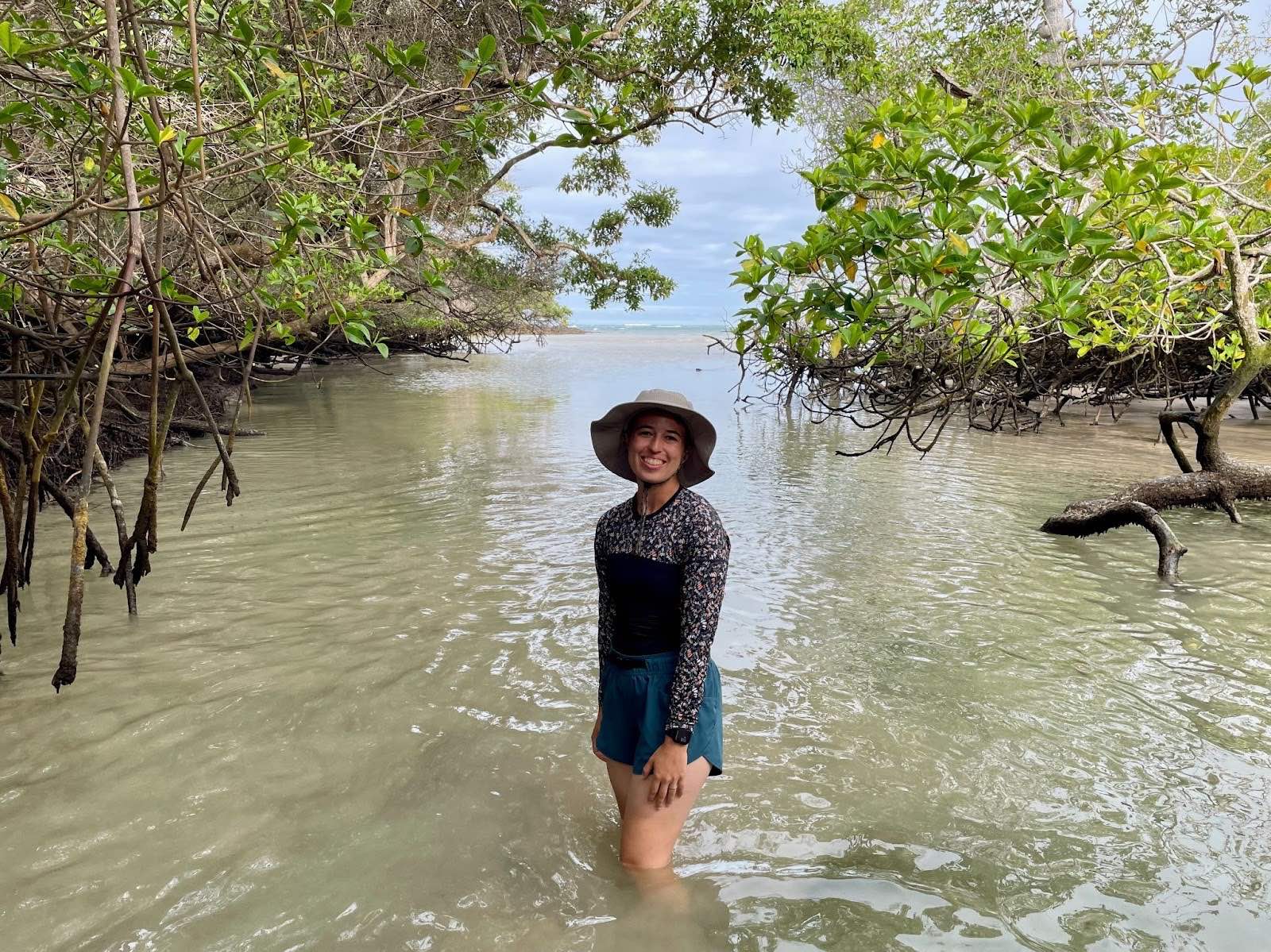 Cosette De Ferrari standing in knee deep water.