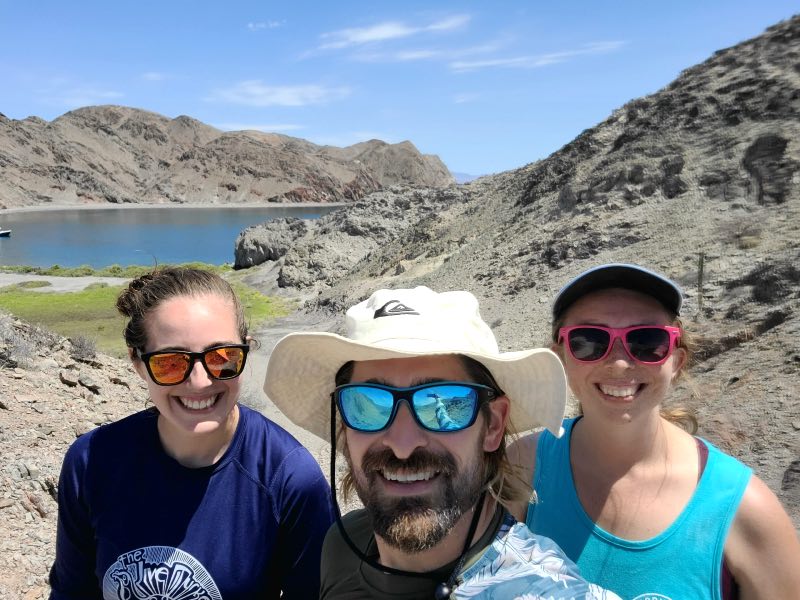 Students taking a picture with the Baja landscape