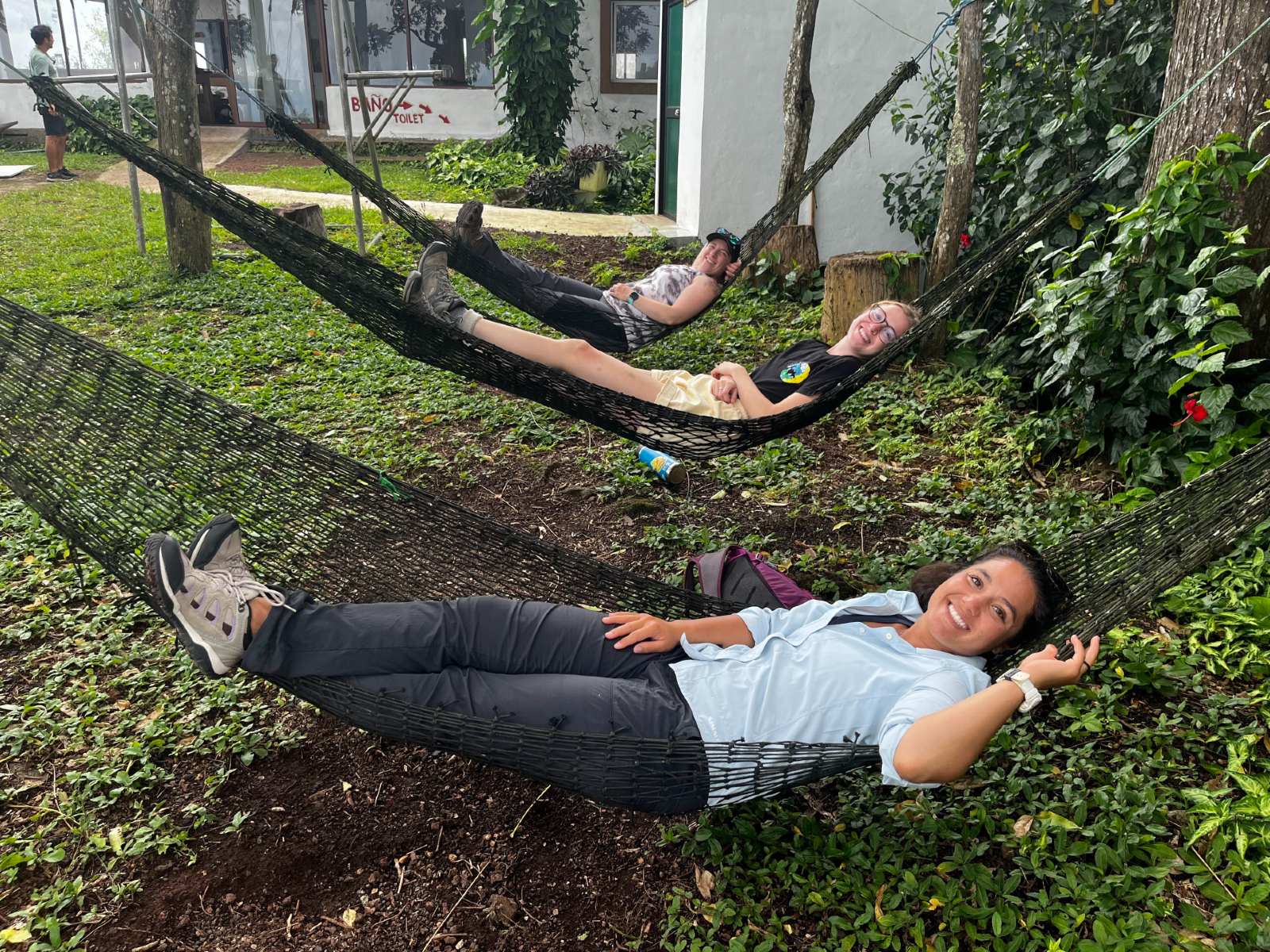 Students hanging on a hammock.