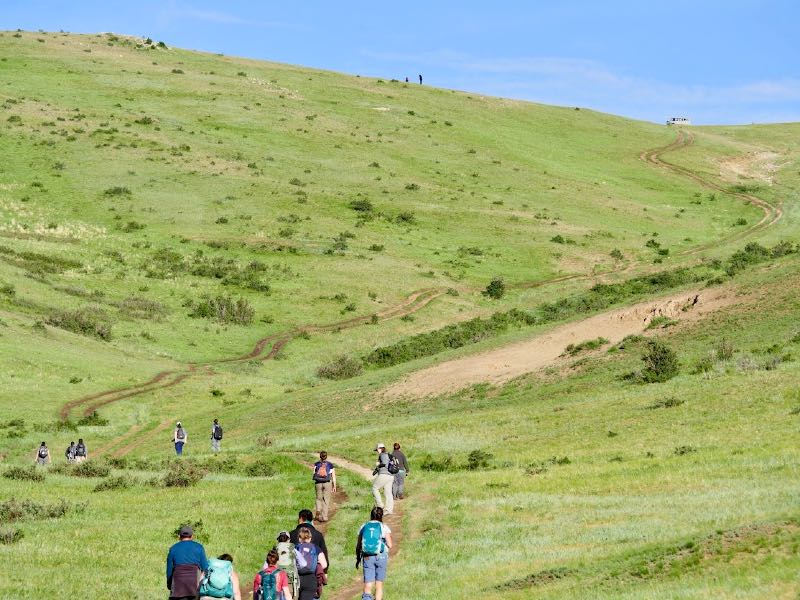 Students walking a trail in the countryside