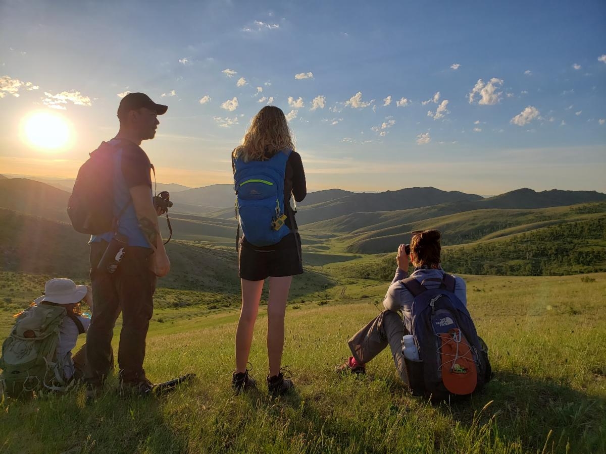 Students overlooking the Mongolian landscape.