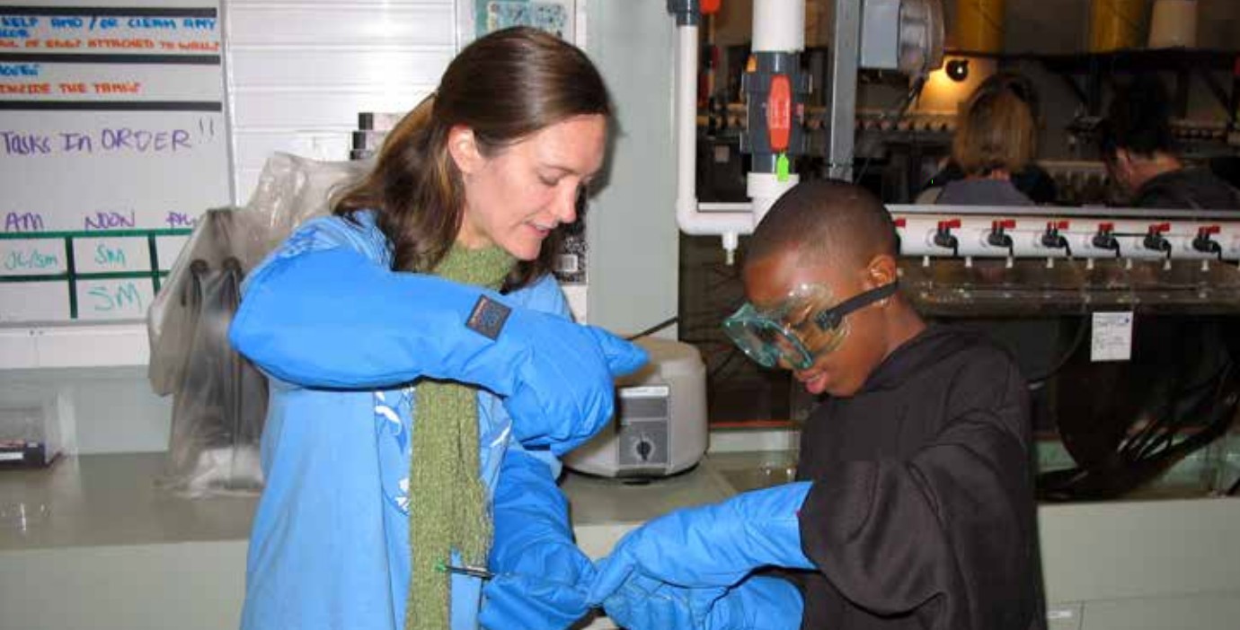 teacher helping student