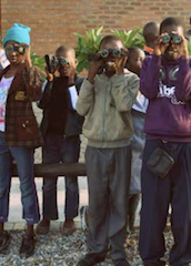 kids looking through binoculars