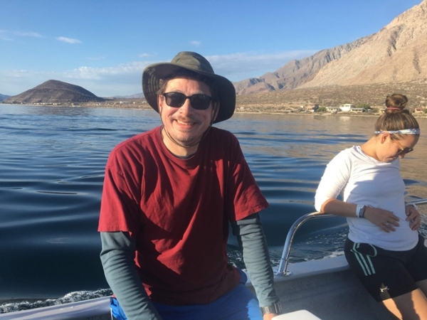 man sitting in boat