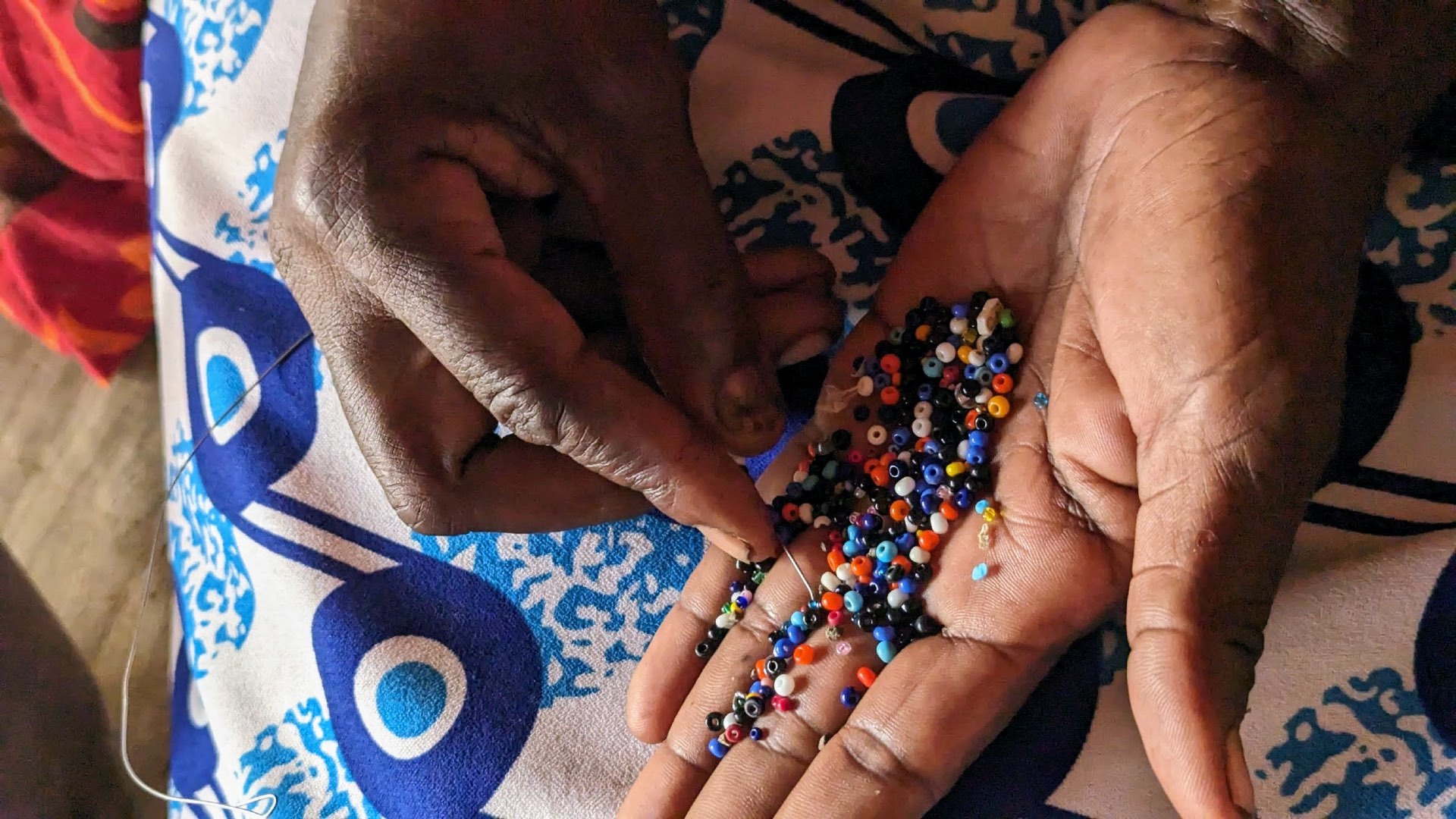 Stringing up beads.