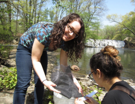 Student smiling to camera.