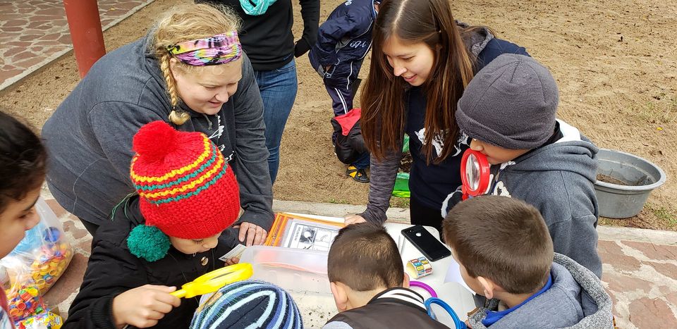 Dragonfly students teaching some kids.