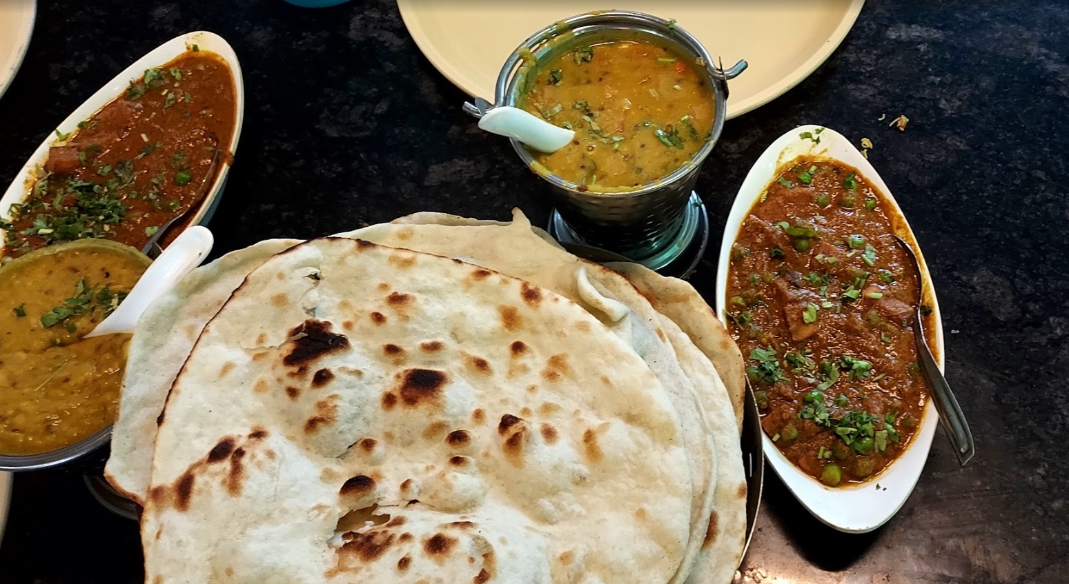Typical food on the course. Naan, Dahl (lentils), and savory dishes. Take it spicy (or not), but enjoy every bite! 