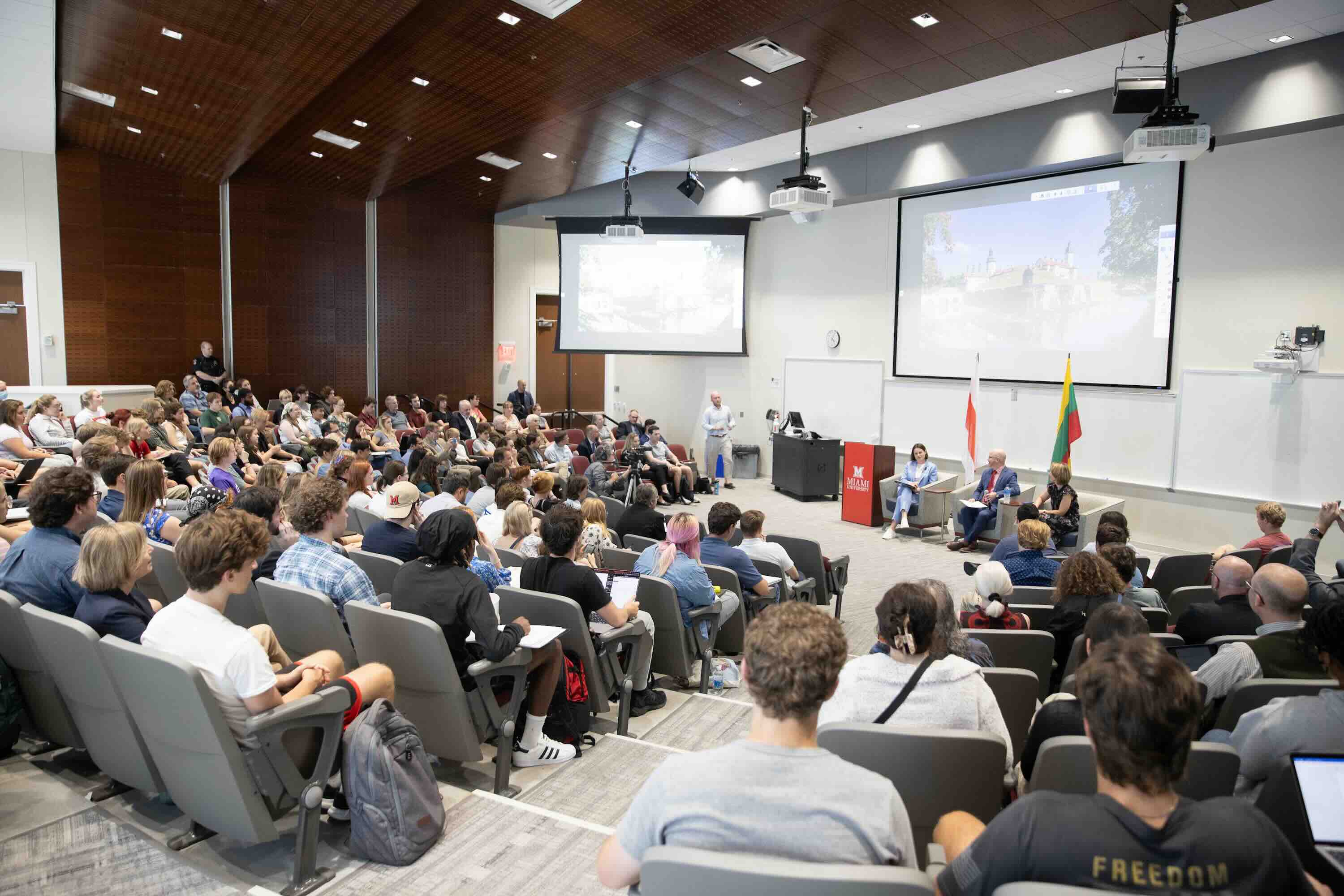 Belarus opposition leader Sviatlana Tsikhanouskaya (in blue), Professor Stephen Norris, and Professor Neringa Klumbyte address a large Shideler audience for the Havighurst Lecture on Sept. 23.