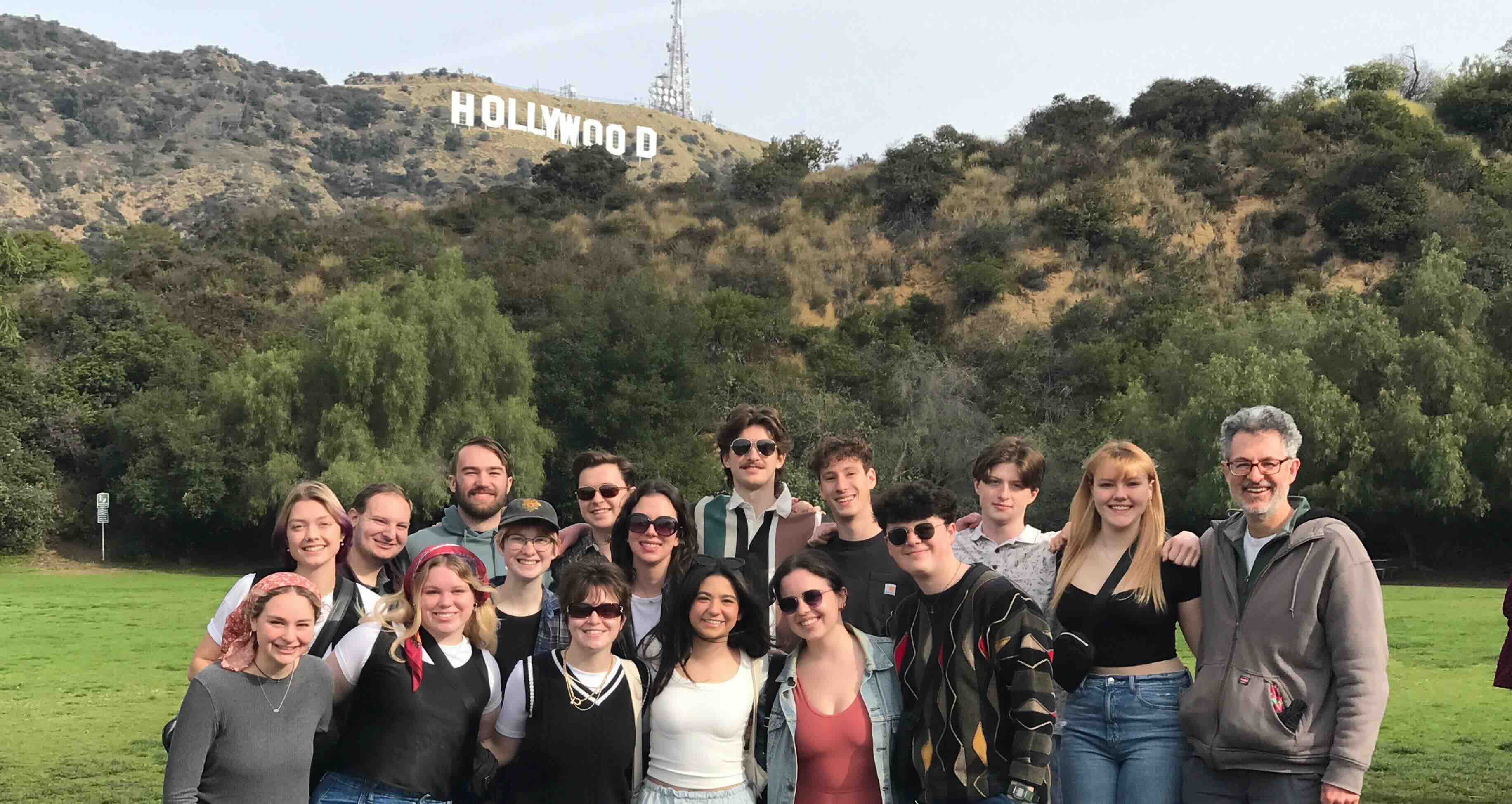 Student in front of Hollywood sign