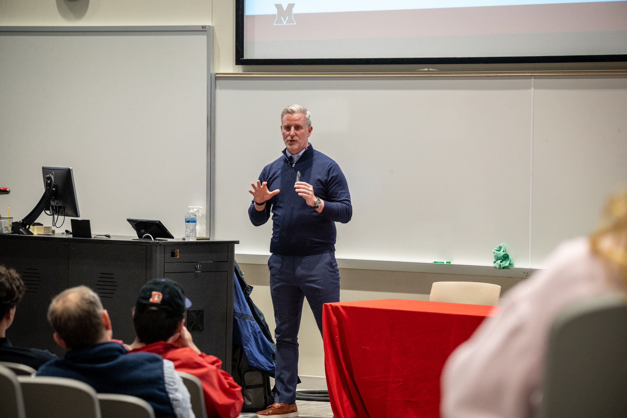 Greg Roche, CEO Distalmotion, speaks to students.