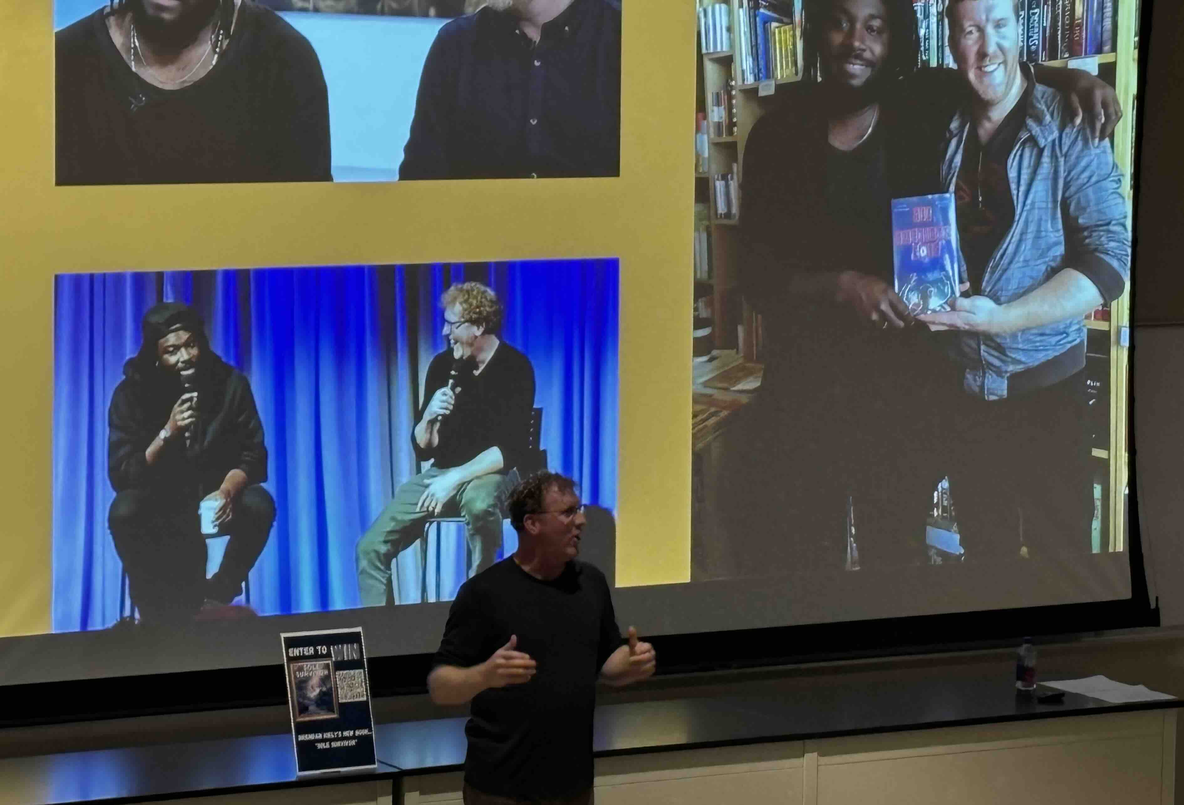Author Brendan Kiely speaks about the craft of young adult storytelling during his presentation, set against a backdrop of images from his events and collaborations.
