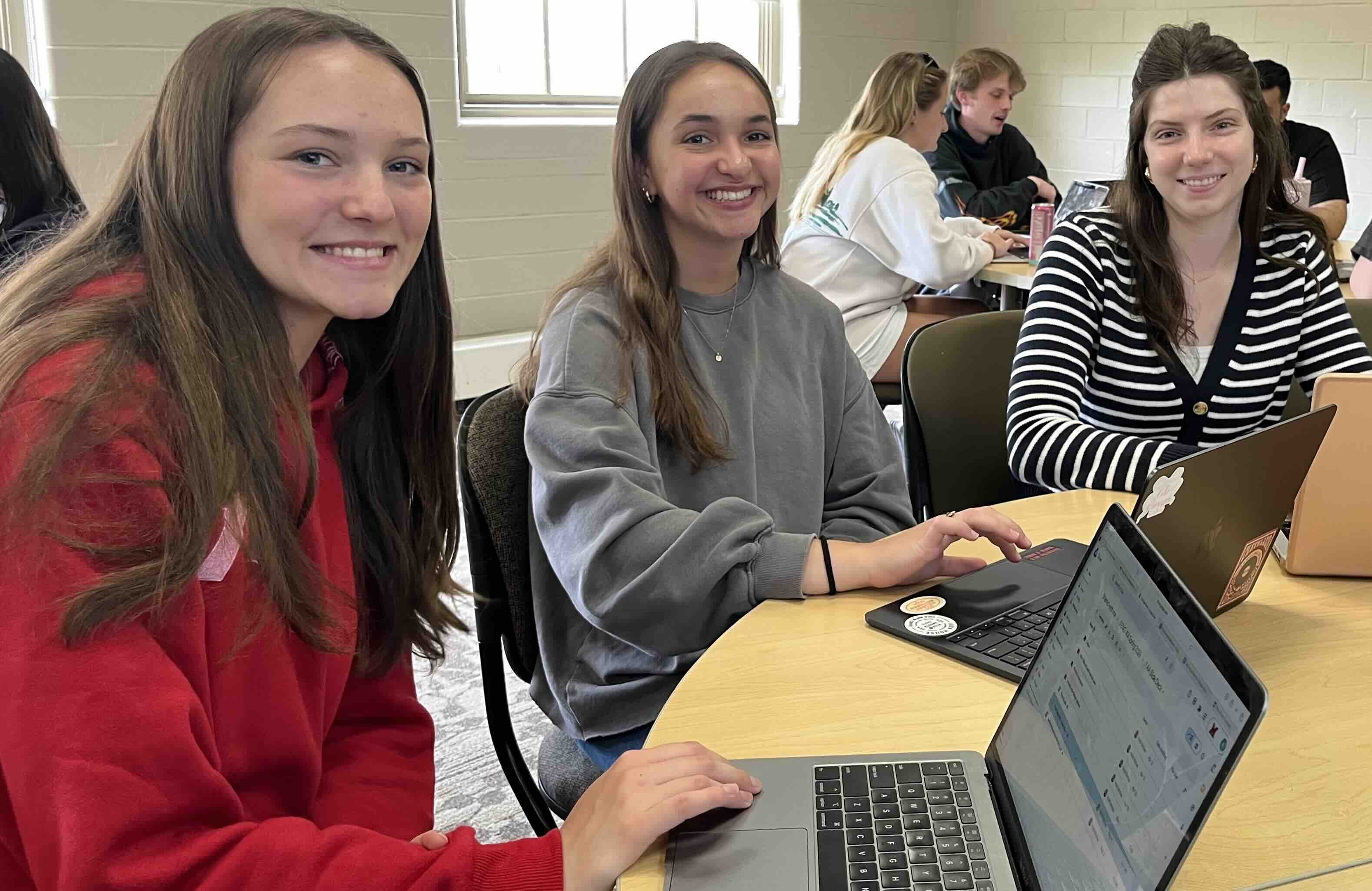 (Left to right) Kayla McNab, Katherine Stefaniuk, and Charlotte Hudson in the final class meeting for ENG 414 - Usability and User Experience. 